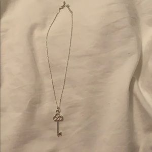 Sterling silver & center stone “key” necklace.